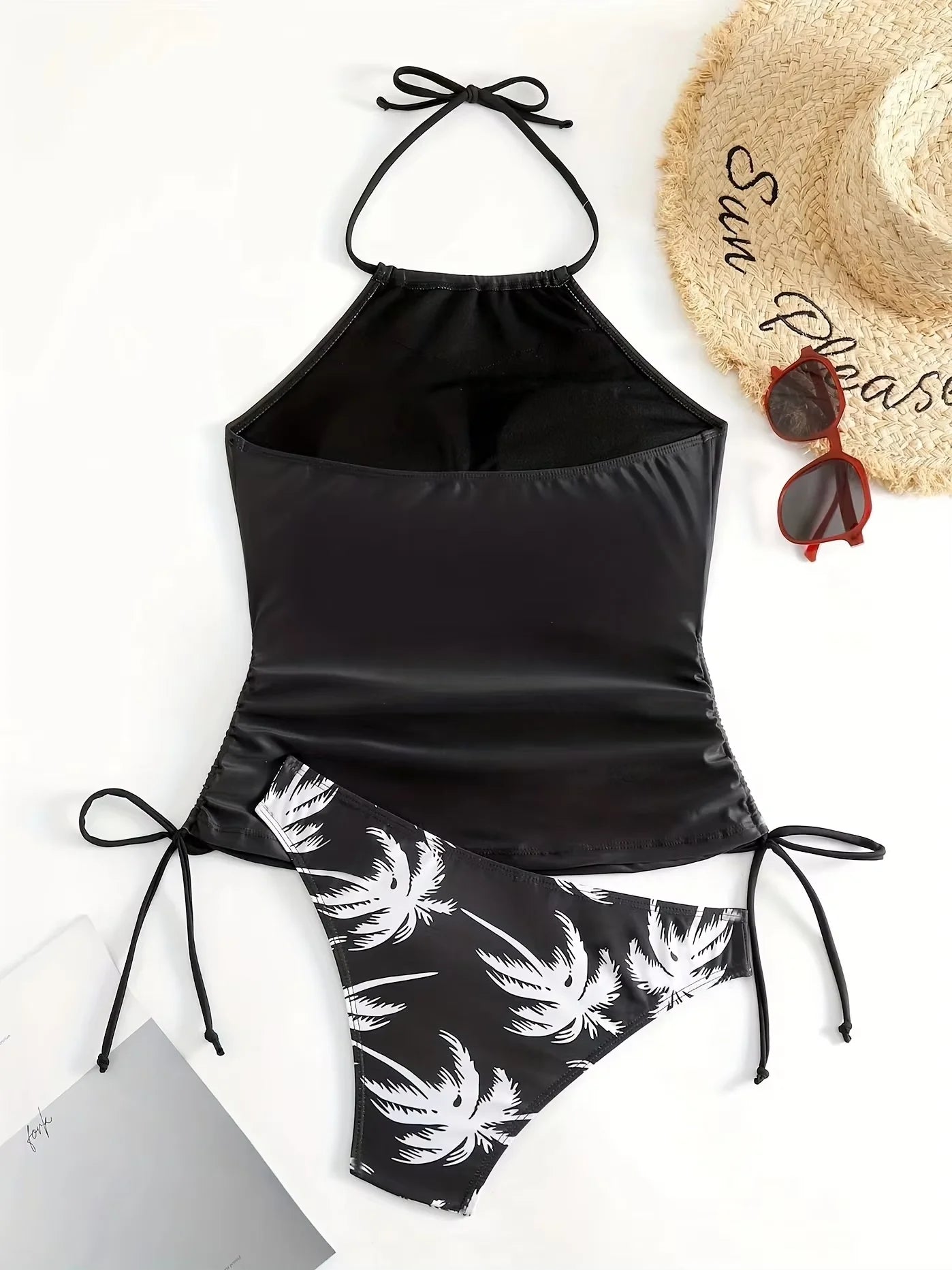 Women's black split bikini set with coconut print and tie up