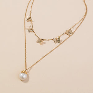 Fashion lattice natural freshwater pearl necklace female temperament European and American personal gold butterfly lock bone chain