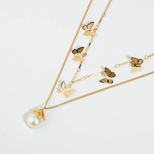 Fashion lattice natural freshwater pearl necklace female temperament European and American personal gold butterfly lock bone chain