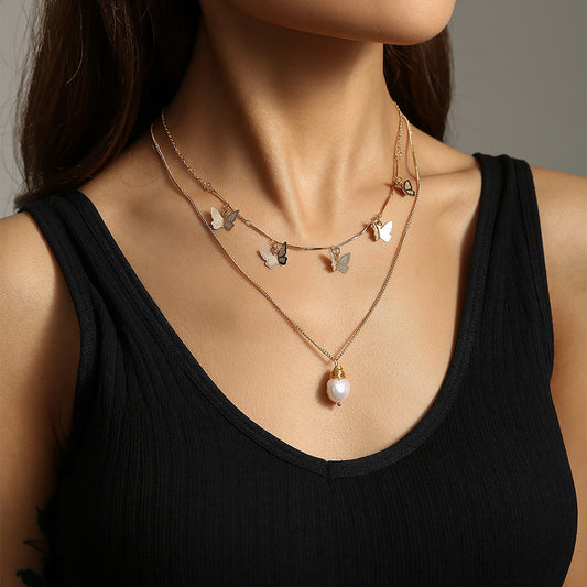 Fashion lattice natural freshwater pearl necklace female temperament European and American personal gold butterfly lock bone chain