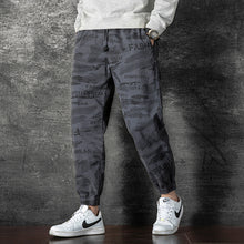 Load image into Gallery viewer, Camouflage overalls Pants: Men&#39;s seasonal trend, versatile, thin elastic belt, foot binding, handsome sports and leisure pants
