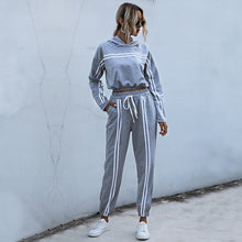 Load image into Gallery viewer, new hooded stripe exposed navel suit women&#39;s fashion careful machine sweater pants two-piece set and one
